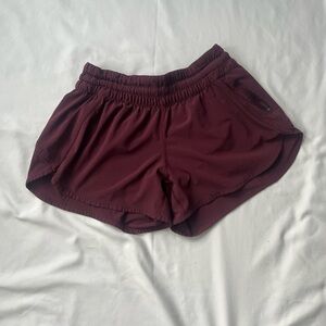 Lululemon running shorts size 10 burgundy zip pocket athletic shorts